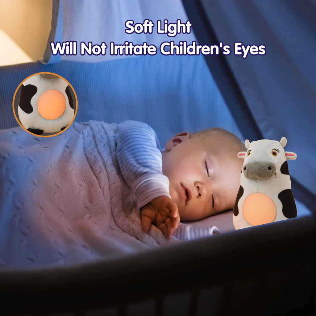 Sleeping child in a crib with a cow toy night light, showing a close-up of the soft light that won't irritate children's eyes.