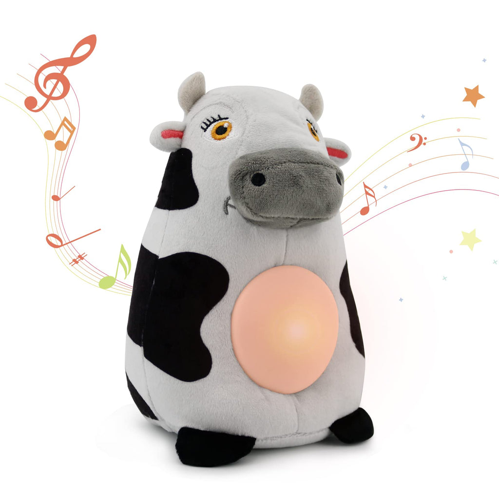 Musical cow plush toy with light-up belly and musical notes illustration, suggesting it plays tunes.